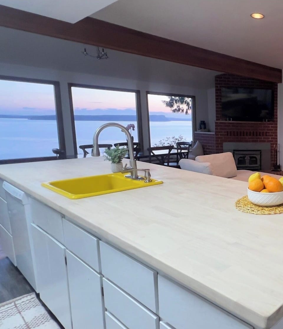Panoramic  views of Puget Sound from our bright, newly renovated, open kitchen.
