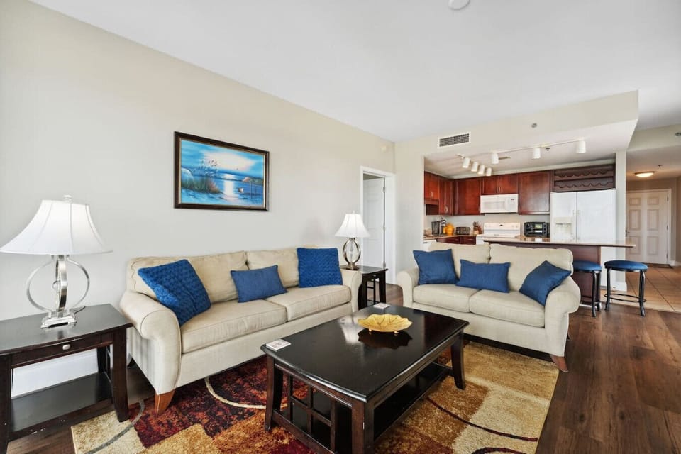 Lakefront Living Area with Sleeper Sofa, Flat Screen TV and Private Furnished Balcony Access