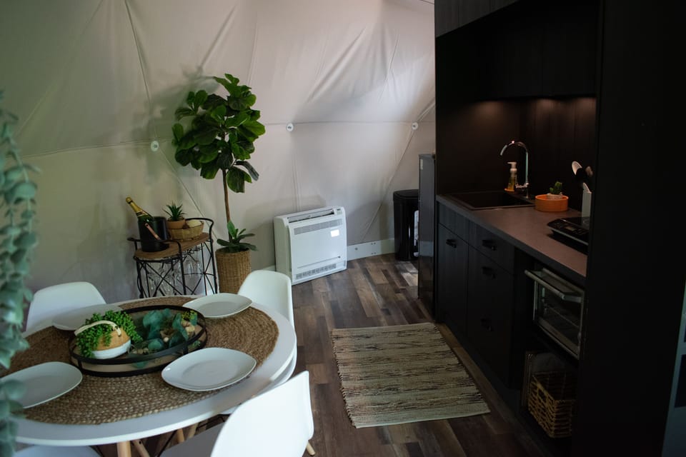 Kitchen and dining area equipped with a bar cart. (2)