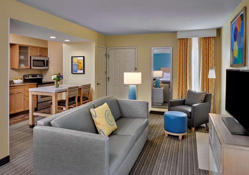 Relax together with a cozy sofa and easy in-room dining.