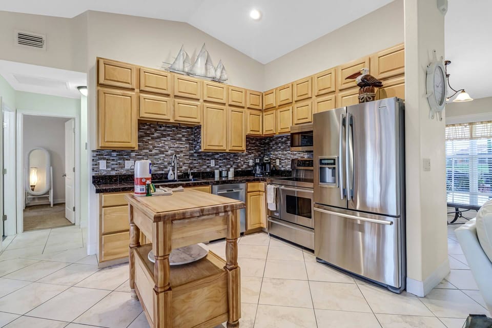 The open kitchen is at the heart of the home and allows for lots of family interaction.