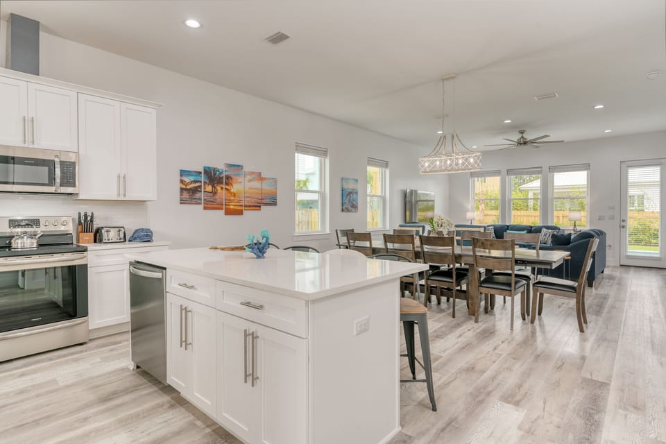 Kitchen is behind the dining area.