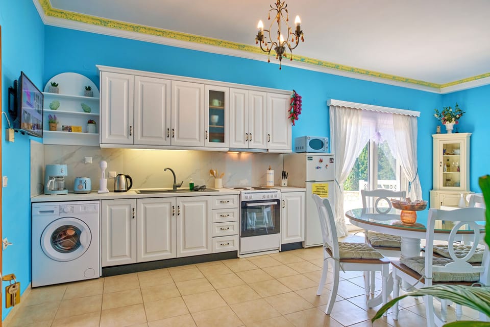 Villa Euphoria Apt 3 Afionas Kitchen and Dining Area