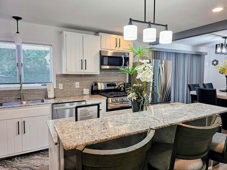 Double layer granite countertops 
Seats 3
