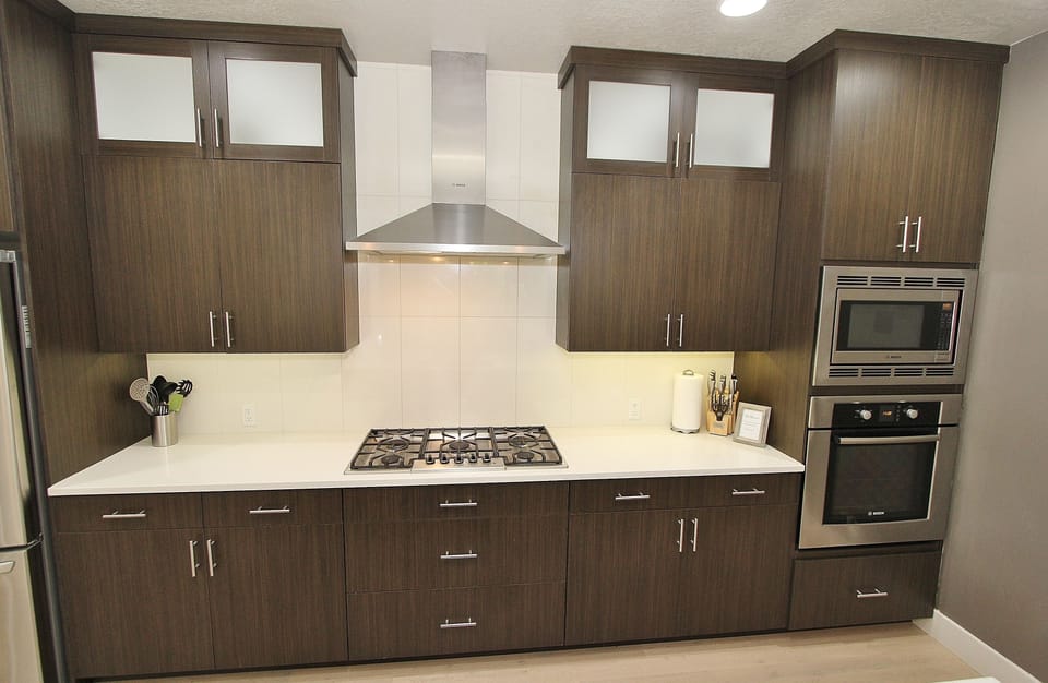 Gas cooktop, microwave, and oven.