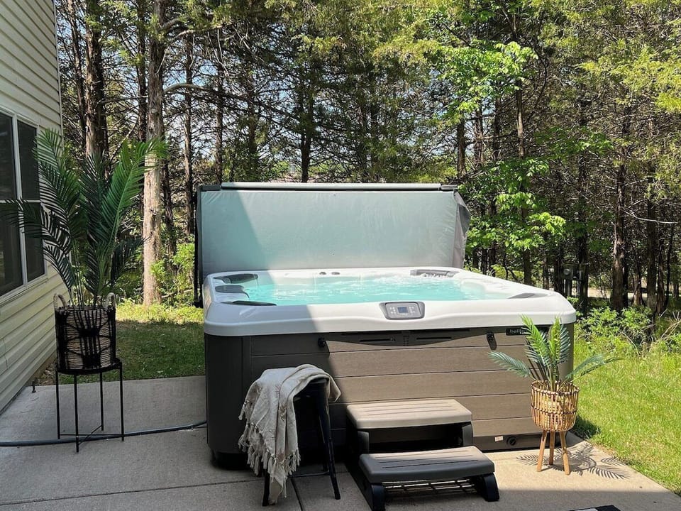 The hot tub is convenientlylocated on lower level right outside the game room in the basement.