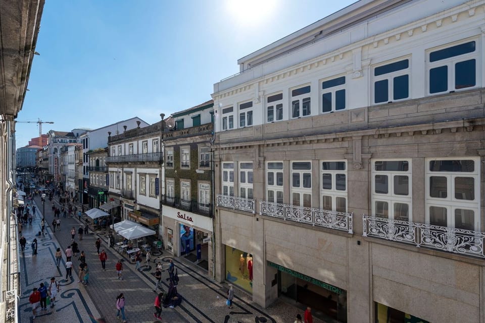 Balcony overlooking Porto's iconic Santa Catarina Street