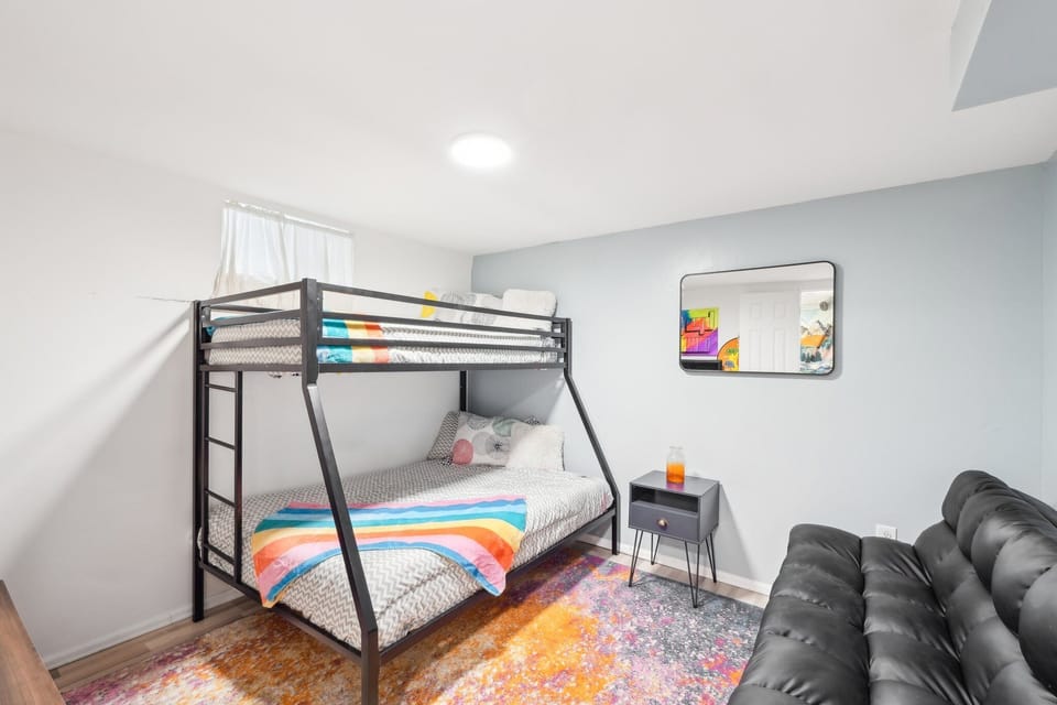 The kiddos will love the 4th bedroom with lots of fun games, bunks, and a couch.