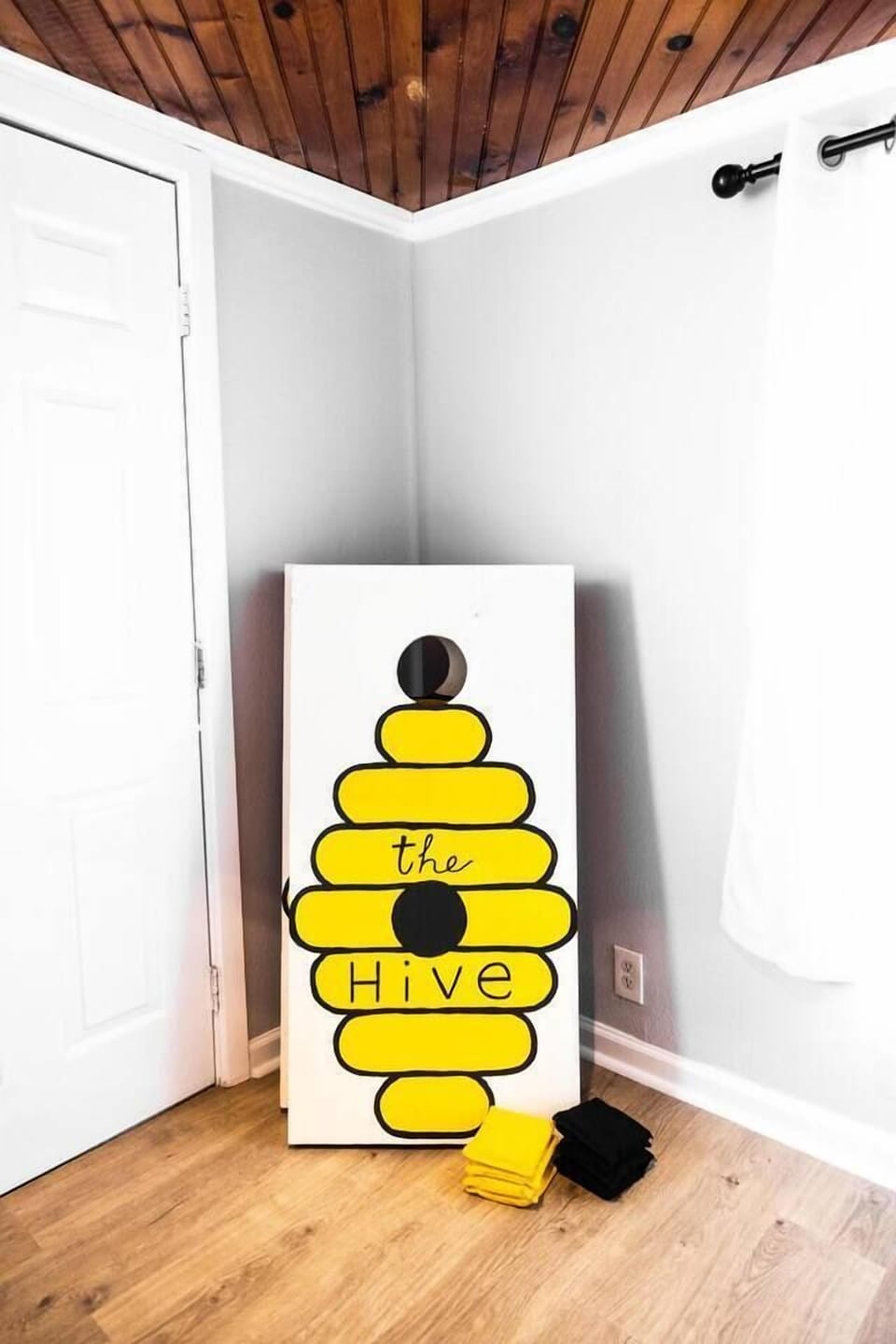 Cornhole boards in the backyard offer fun entertainment for guests of all ages during your stay.