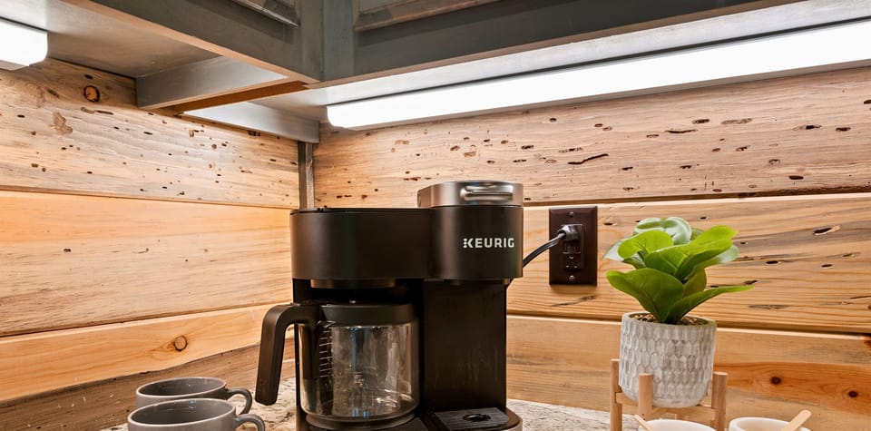 Start your morning right with our convenient Keurig coffee maker, complete with complimentary coffee pods to kickstart your day.