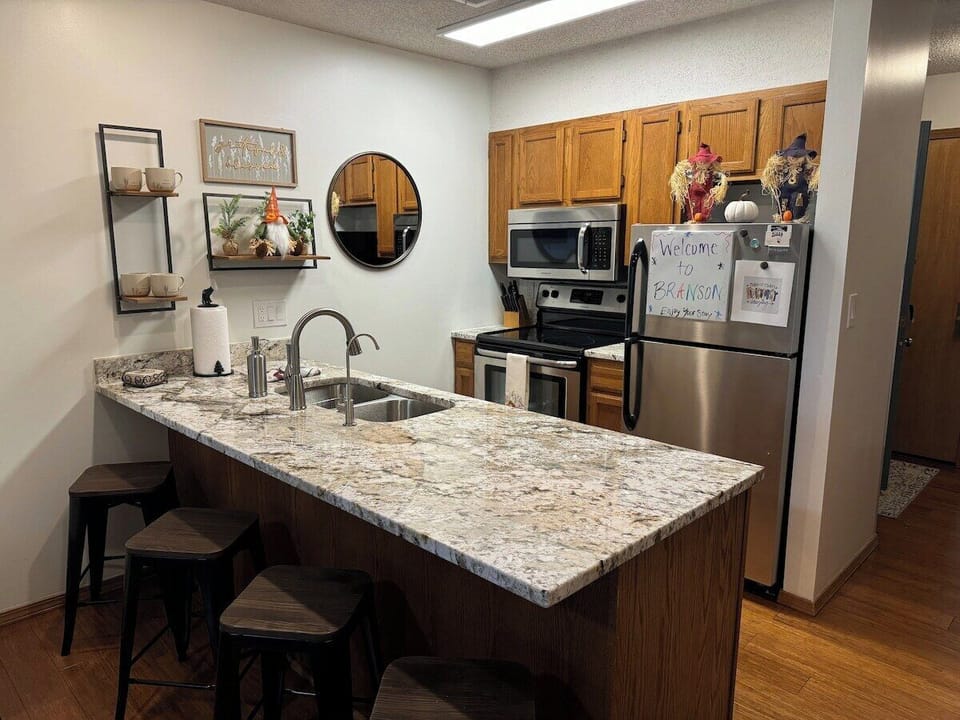With the oversize countertop and the barstools, this makes a perfect spot to have some breakfast with you coffee in the mornings, Don't mind the fall Nomes or scare crow's they already had breakfast.