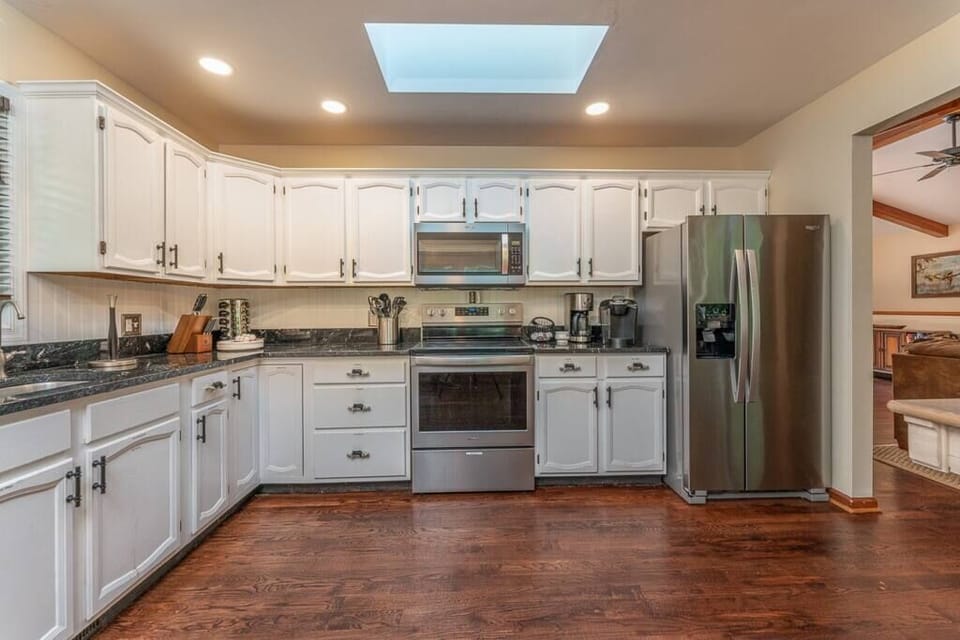Fully Stocked Kitchen  w/ Breakfast Table, Refrigerator, Microwave, Oven, Stove, Dishwasher, Sink, Coffee Maker, Cooking Utensils and Much More