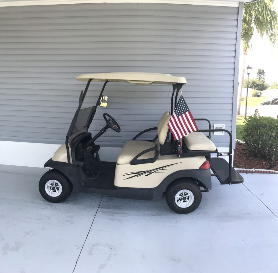 Four person golf cart with seat belts for our guests usage