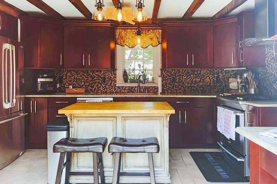 Spacious kitchen opens up to the back patio