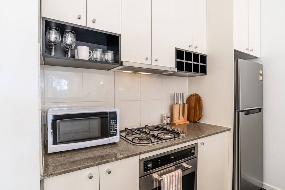 Fully equipped kitchen with utensil and appliances