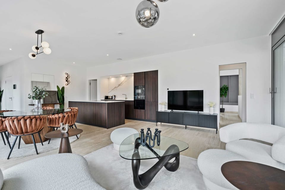 Chic comfort meets contemporary design in this airy lounge area.