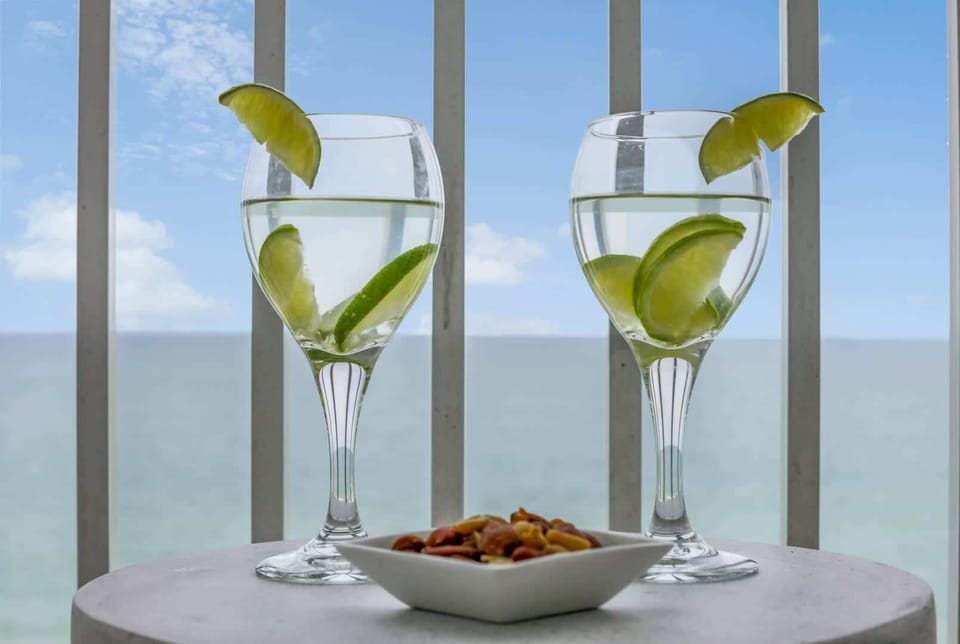 Indulge in refreshing drinks and light bites as you take in stunning ocean views from your private balcony. The perfect spot to relax, unwind, and create unforgettable seaside memories!