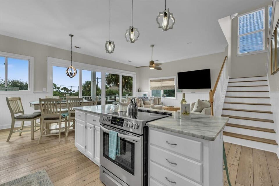 full view of the third floor kitchen, dining room, and Living room 