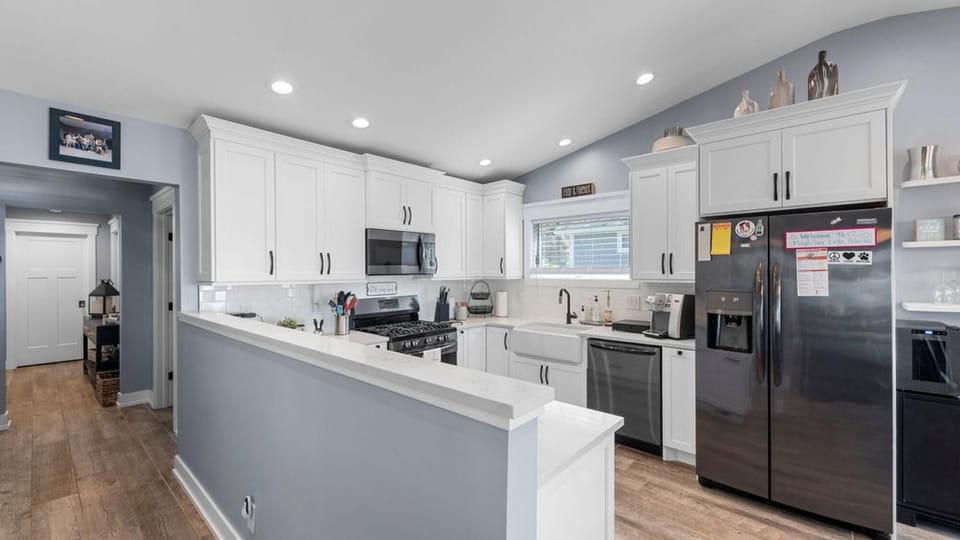 Bright, modern kitchen with spacious island and stainless appliances