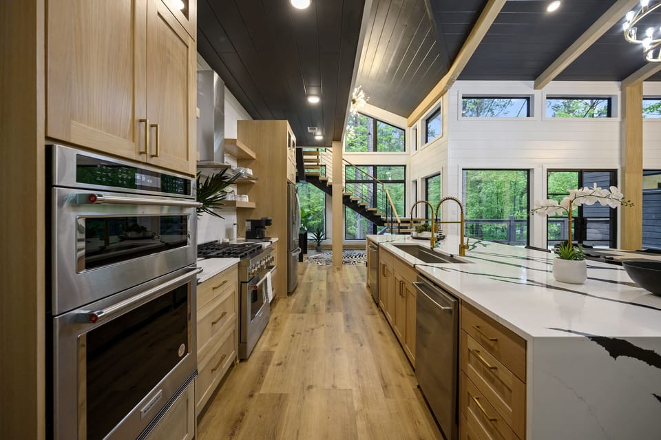 Chefs dream! Double ovens, 6 burner range, and ample prep space!