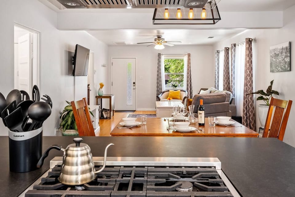 Open floor plan with chef's kitchen and seating for up to six.