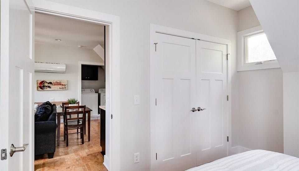 A soft transition from bedroom to main living area.