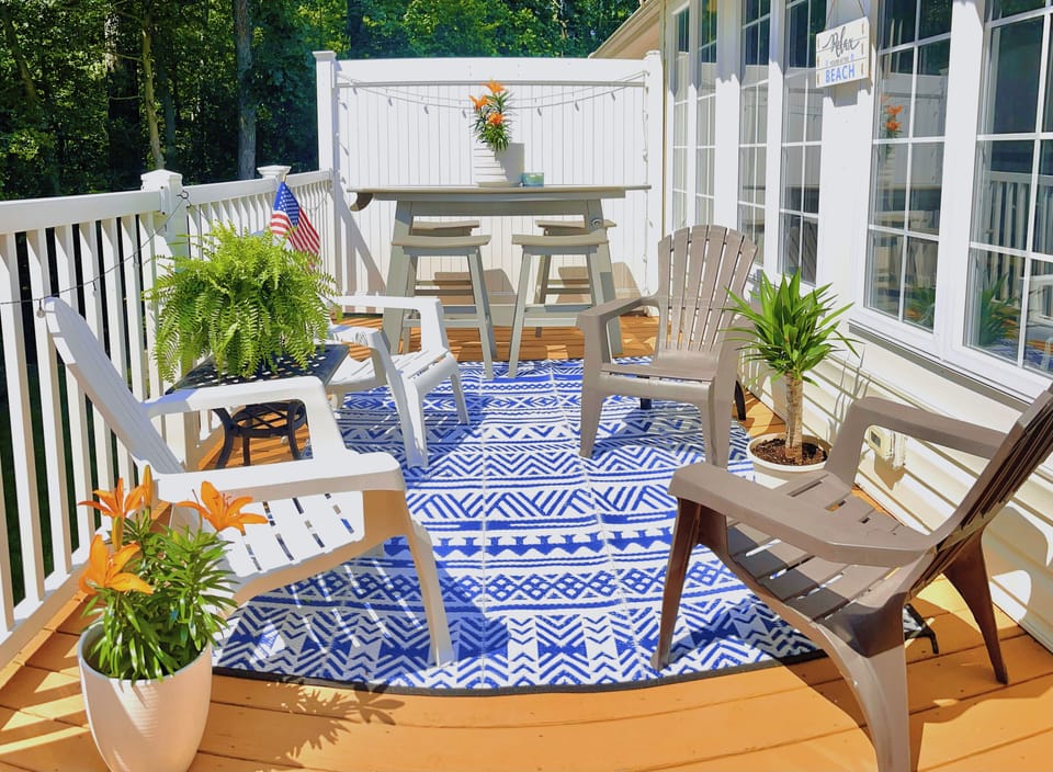 Private, spacious deck with motorized awning for shade and plenty of seating.