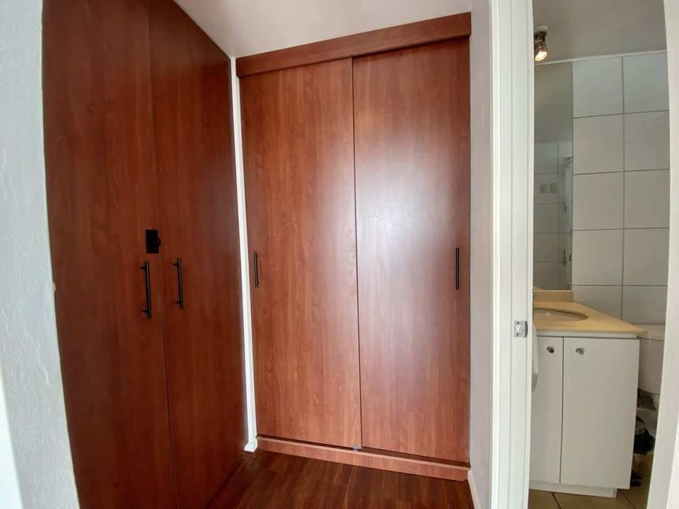 Large built-in closet offering generous storage space
