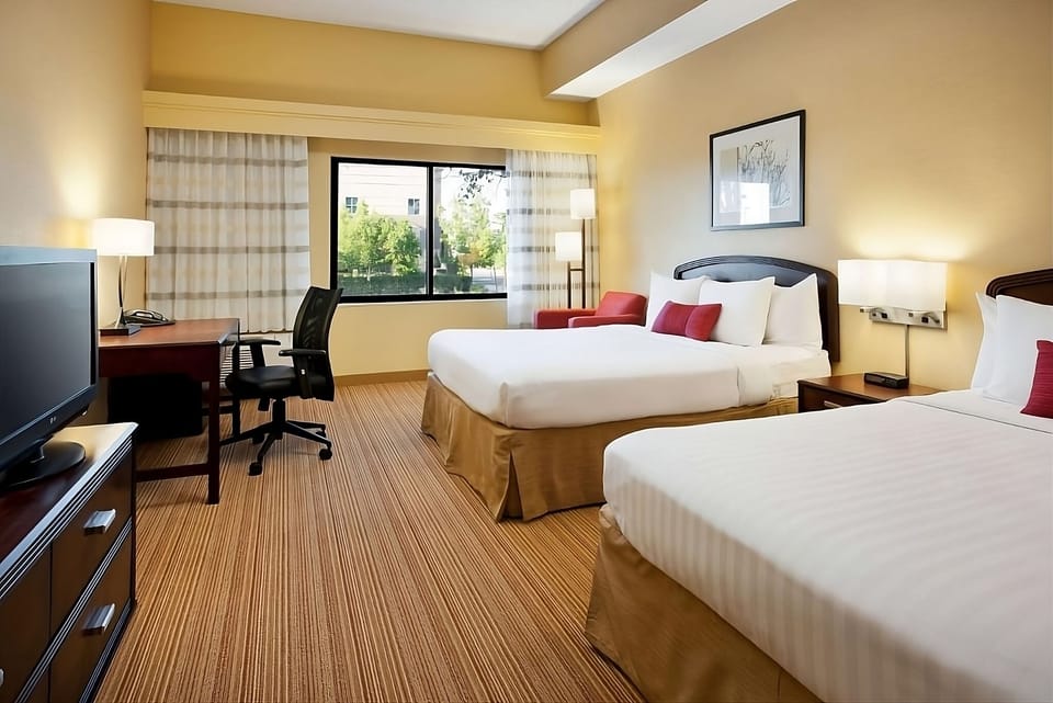 Wake refreshed in airy double beds with crisp linens.
