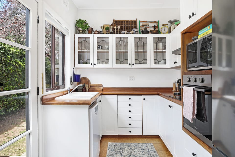 Kitchen fully set up for cooking and entertaining, with dishwasher,
