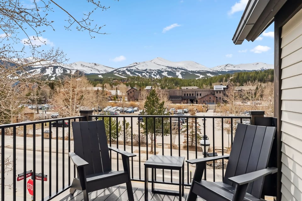 Private front balcony with Adirondack chairs