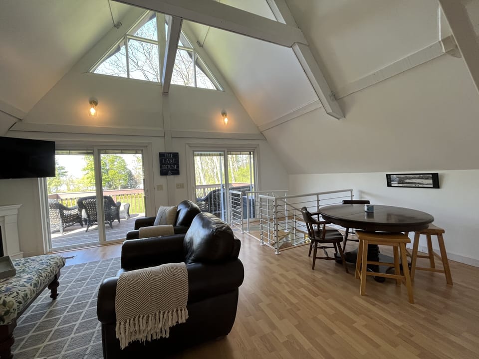 Main living area with living room, dining nook, great views and lots of sunlight