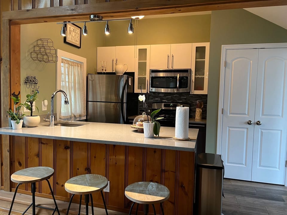 3 bar stools at the kitchen bar