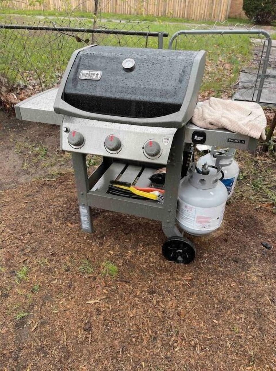 Grill with propane tanks