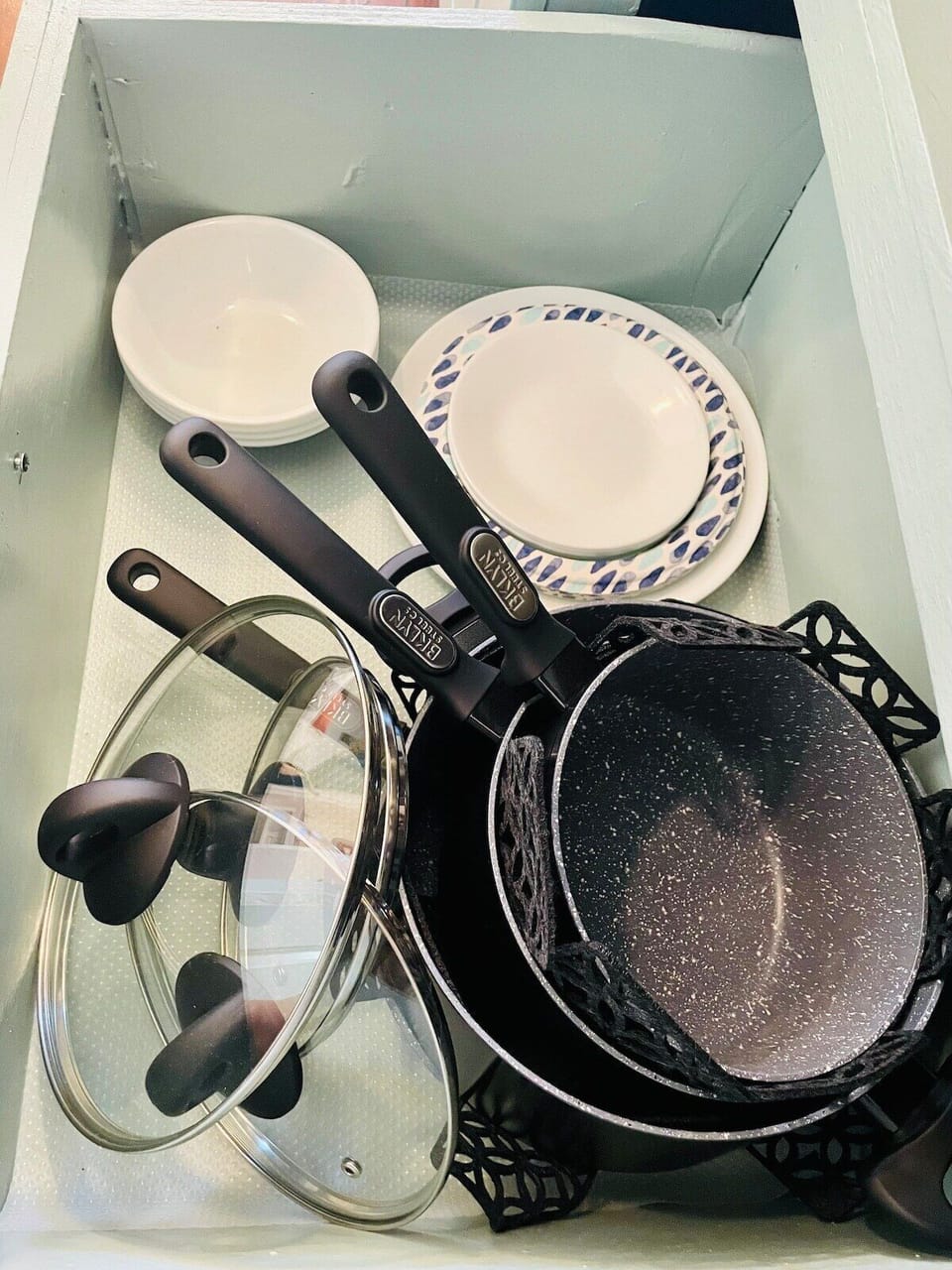 Plates, bowls, pots, and pans.