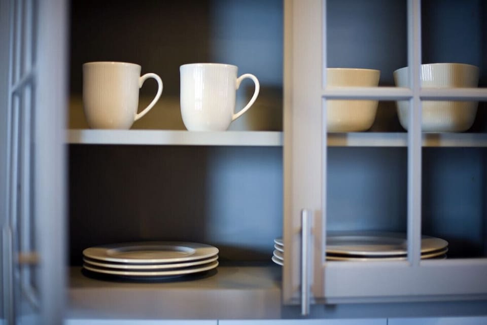 Fully stocked kitchen cabinets and ample counter space.