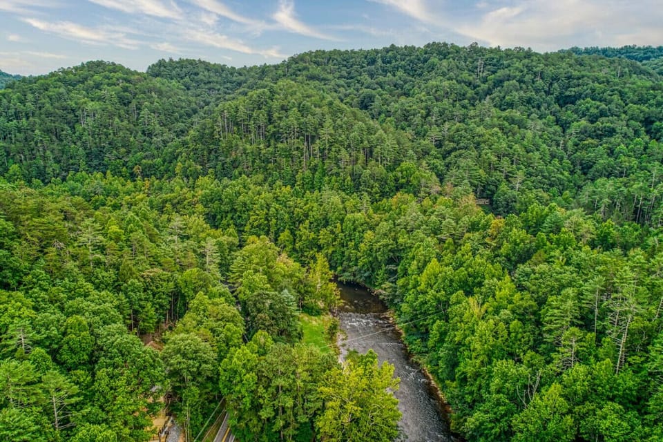 Aerial view overlooking the Little Pigeon River and the Smoky Mountains.