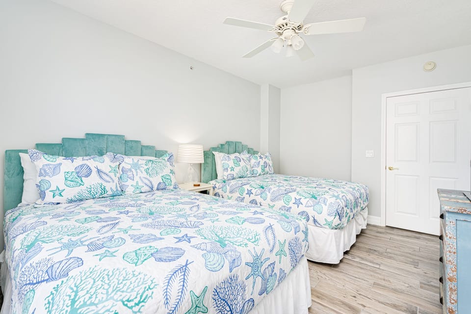 Two queen beds and a Smart TV