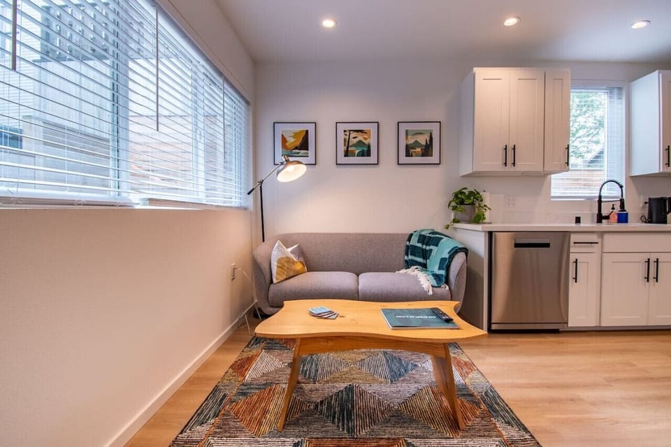 Experience comfort in our simple living space! The cozy sofa and center table make it ideal for relaxing.