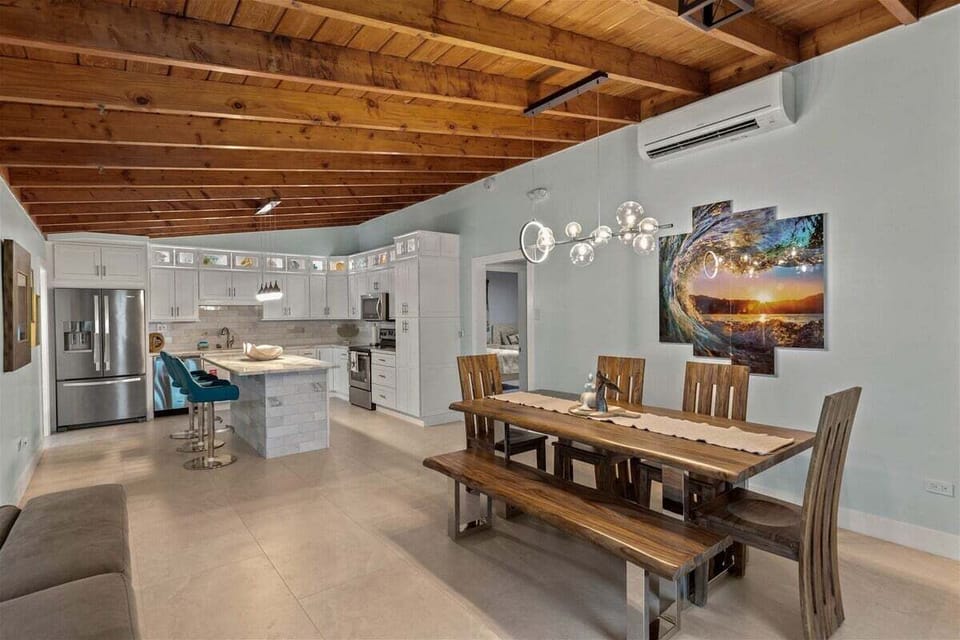 Open-concept living and dining spaces make entertaining effortless after a day on the water.