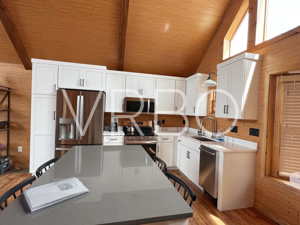 New kitchen (May 2024) with Quartz countertops.
