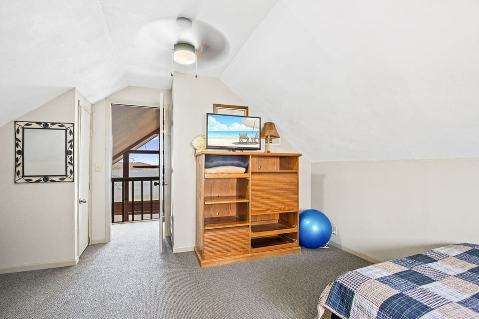 The loft area has a television, games and electric piano.