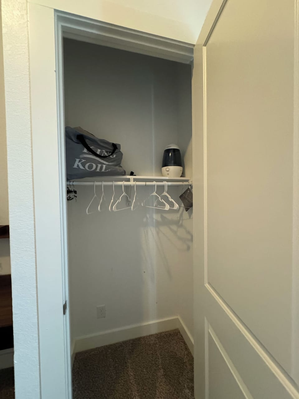 2nd bedroom closet with queen size air mattress 