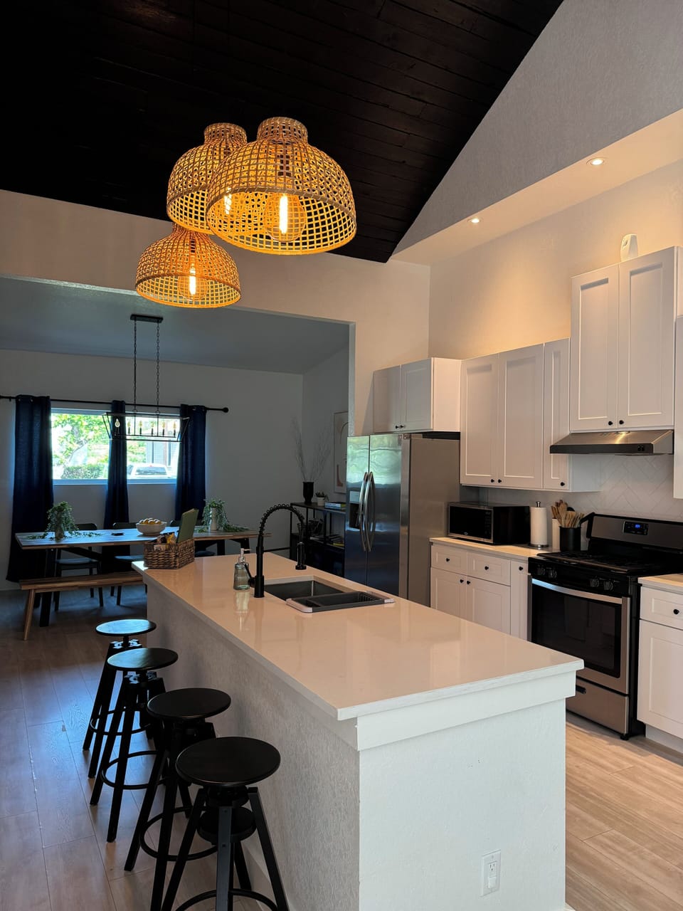 Island in kitchen open concept for conversation and enjoyment