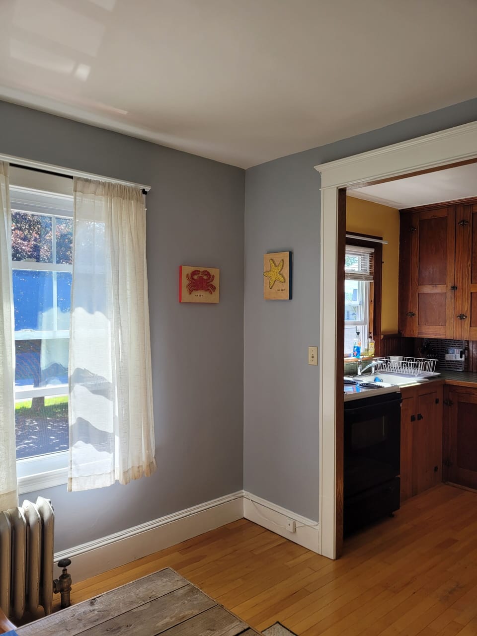 Looking from the dining room into the kitchen.