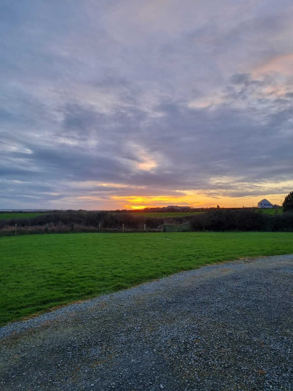 Sunset and view of Hook Lighthouse from  house