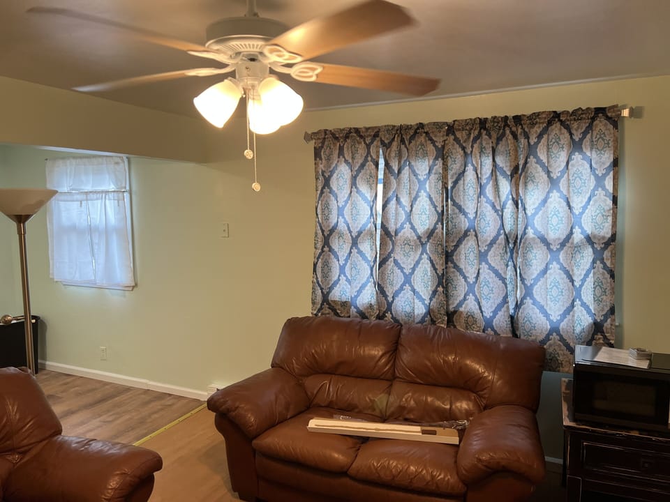 Furniture, Indoors, Living Room, Couch, Floor
