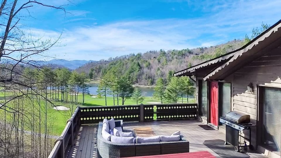 A large deck welcomes guests with great views and plenty of seating. This is the perfect spot to gather with family and friends. The playground is visible from the deck, so parents can easily watch the kids while relaxing!