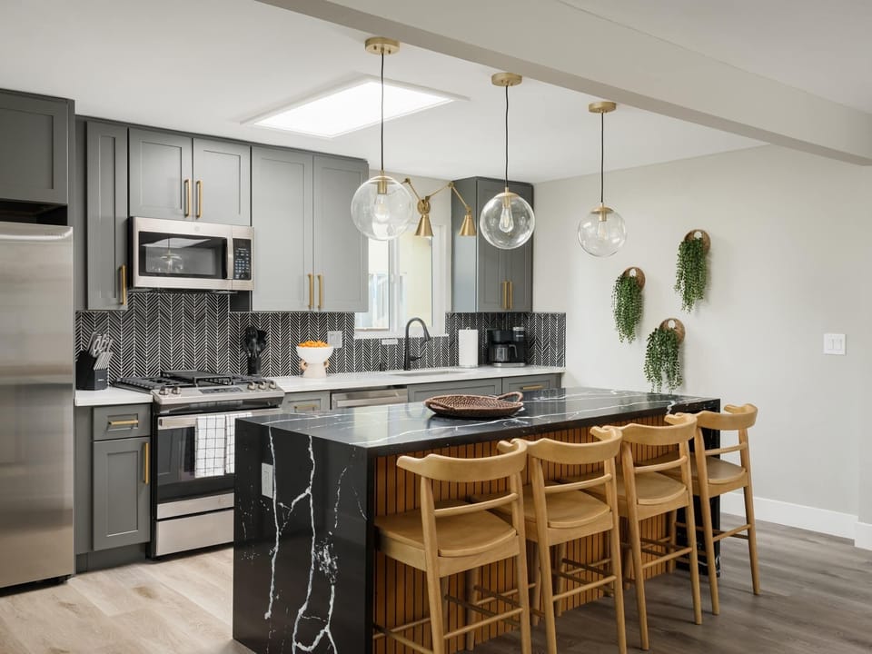 Full Kitchen | Black Marble Island | Bar Seating for Four