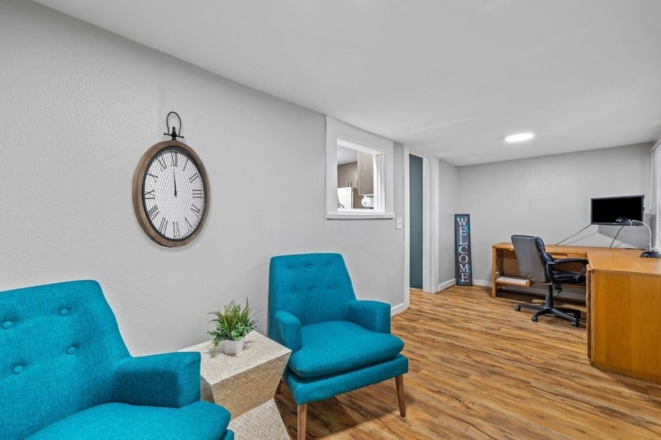 Welcome! This is what you and your guests will see when you open the door to you temporary home. It's perfect for morning coffee and can be used as a reading area or a peaceful work space.